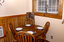 Picture of the cabin's dining area seating 4